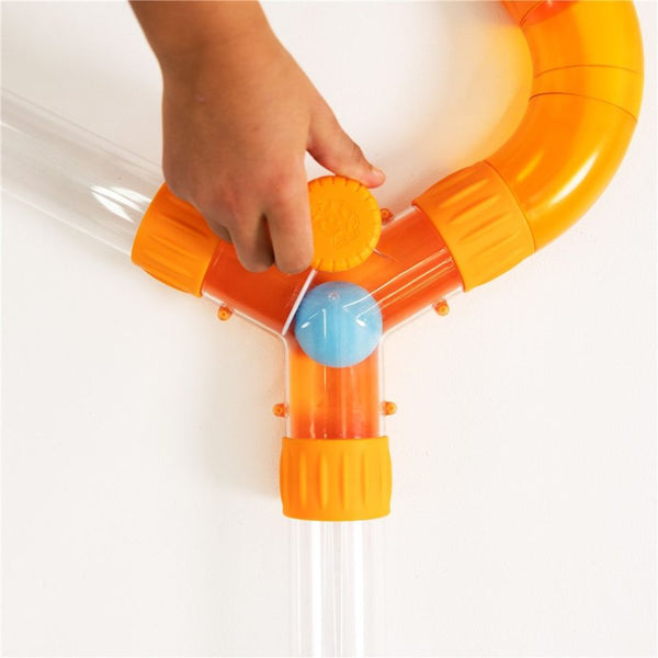 Hand showing the Fat Brain Toy Co Air Toobz Switch Accessory | STEM Building Toy 3 Years +