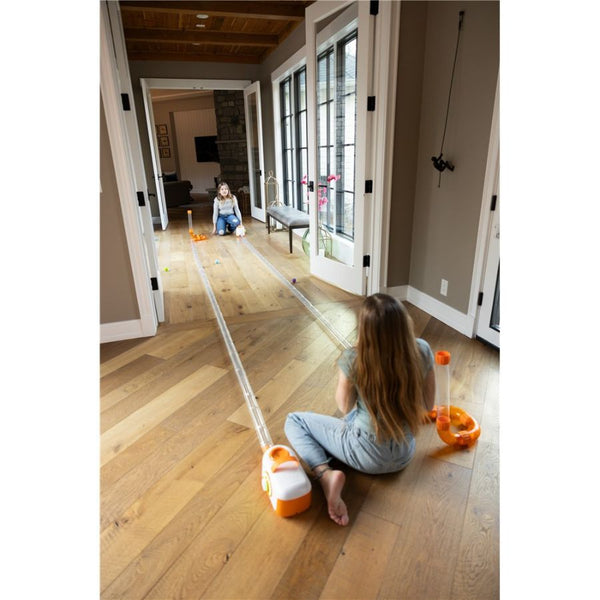 Picture of two girls playing with Fat Brain Toy Co Air Toobz Mega Run 100ft Distance Kit | Ages 6+